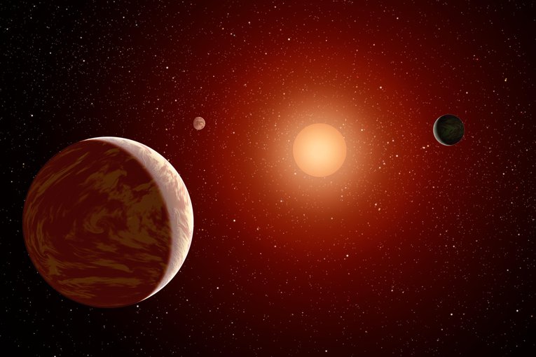 Artist’s impression of
                        a M dwarf star surrounded by planets. Credit: NASA/JPL-Caltech/MSSS.